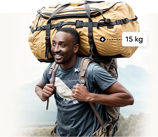 Kilimandscharo-Träger mit einer 15 kg schweren Expeditions-Duffelbag Kilimandscharo-Träger mit einer 15 kg schweren Expeditions-Duffelbag